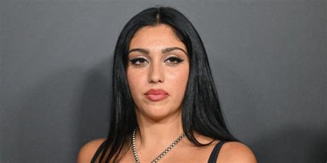 Lourdes Leon just posed basically nude with only bags for clothes